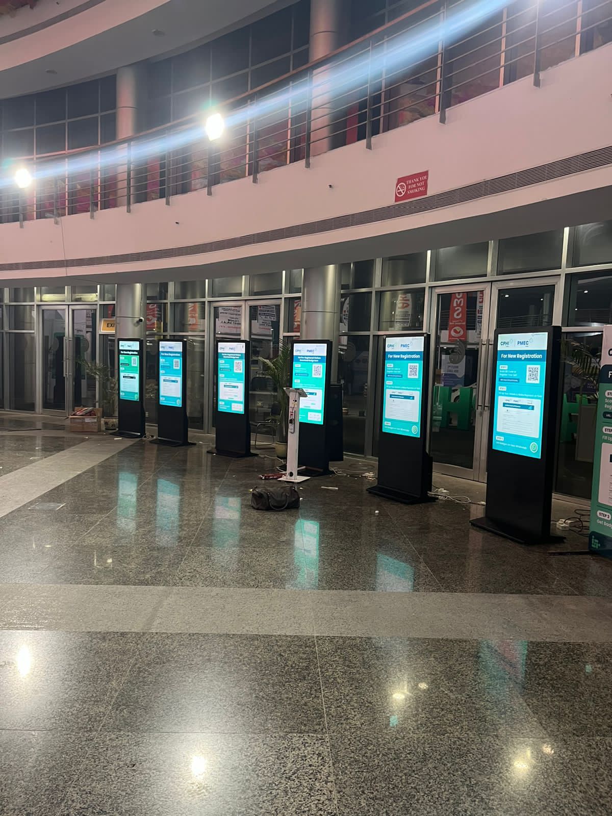 Self-service registration digital standees installed at the CPHI–PMEC pharma expo — Vertex Edges